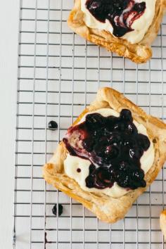 
                    
                        puff pastry tarts with twangy blueberries
                    
                