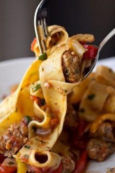 Italian “Drunken” Noodles with Italian Sausage, Tomatoes and Caramelized Onions and Red and Yellow Bell Peppers, with Fresh Basil. So yummy! I used red wine (chianti) instead of white, chopped up tomatoes from the garden that I had frozen, and a couple tablespoons of tomato paste. I also used mild Italian sausage since Brian doesn't like spicy and added shaved parm on top.