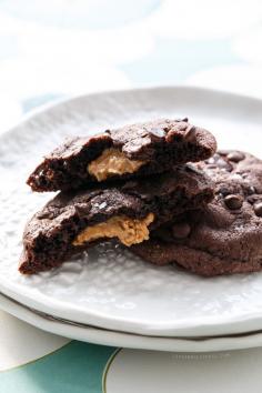 
                    
                        These sweet and salty dark chocolate cookies have a surprise peanut butter filling. Enjoy one warm right out of the oven while the filling is still soft and gooey.
                    
                
