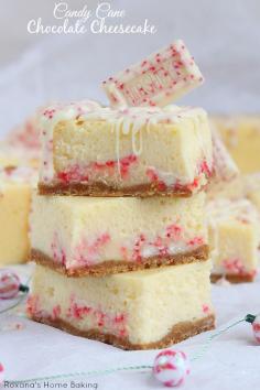 Candy Cane Chocolate Cheesecake Bars Recipe ~ Velvety peppermint cheesecake with swirls of white chocolate candy cane bars and topped with a piece of chocolate, these festive chocolate cheesecake bars are a showstopper