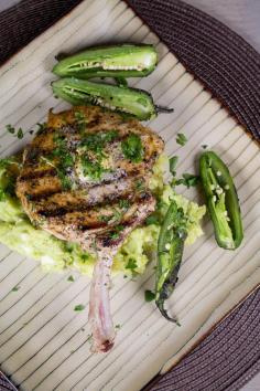 
                    
                        Grilled Pork Chops Over Avocado-Potato Smash with Roasted Jalapeno Peppers
                    
                