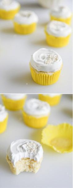 
                    
                        Fluffy Lemon Cupcakes with Whipped Coconut Cream I howsweeteats.com
                    
                