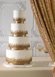 
                    
                        Tarta de bodas en blanco y dorado
                    
                