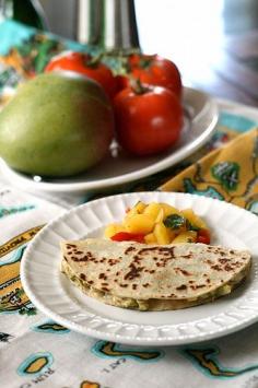 
                    
                        cumin spiced chicken + avocado quesadillas with mango salsa
                    
                