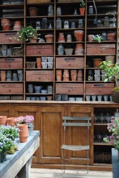 
                    
                        Bookcase filled with plants and pots, for the shop. Spring clean in the shed. | Image via: 24.media.tumblr.com
                    
                