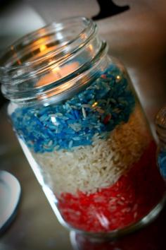 Memorial day or 4th of July Candle idea: food colored rice layered in mason jar.  Top with tealight.
