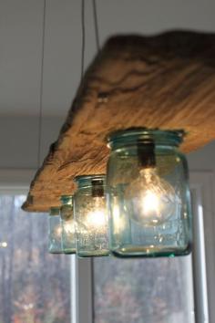 
                    
                        Driftwood and Antique Jar Hanging Light. $325.00, via Etsy.
                    
                