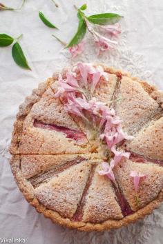 
                    
                        Roasted Rhubarb Bakewell Tart. Buttery tart filled with almond filling and roasted rhubarb. Another take on the British classic.
                    
                