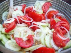 Marinated cucumbers tomatoes and onions. RECIPE INCLUDED.