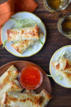 Crispy Baked Chicken Spring Rolls. Filled with a hearty mix of chicken, shredded green cabbage, sliced shitake mushrooms, and tons of fresh garlic and ginger. A fantastic recipe.  #baked #springrolls #chicken #partyfood #fingerfood #recipe #smarthomesforliving