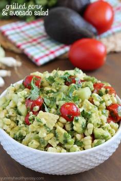 Grilled Corn & Avocado Salad | Delicious grilled corn mixed together with avocado, tomato, feta, green onions, cilantro and cucumber then tossed in an easy dressing.