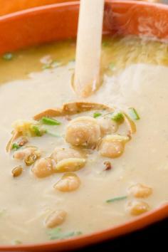 Creamy Chickpea Soup #Recipe  Ingredients Serves 6  3 tbsp olive oil  5 garlic cloves, finely chopped  1 tbsp fresh rosemary, minced  ⁄ tsp crushed red pepper flakes  3 can (15 - 19 ounces each) garbanzo beans, rinsed & drained  4 cup chicken broth, (or vegetable)  2 tbsp fresh lemon juice  1 sea salt  Directions  1. In a large saucepan, heat the oil over medium heat and add garlic, rosemary and red pepper flakes.  2. Cook, stirring constantly, until the garlic starts to brown, about 1 minute. Add chickpeas and cook 2 minutes, stirring constantly. Add chicken broth and bring to a boil.  4. Reduce heat and simmer 30 minutes; let cool slightly.  5. Transfer soup to a blender; cover loosely, and puree until just smooth.  6. Return to the saucepan and stir in lemon juice and sea salt to taste.  7. Serve, garnished with a fresh rosemary sprig, or an additional drizzling of olive oil.