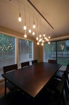 great lighting fixture for dining room.  alternative to chandelier for a long table rather than round/square