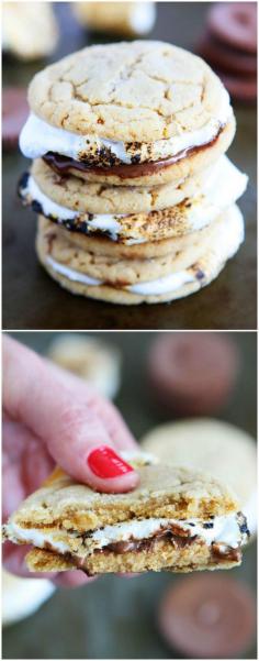 
                    
                        Peanut Butter Cookie S'mores on twopeasandtheirpo... The BEST S'mores! Peanut butter cookies with toasted marshmallows and peanut butter cups!
                    
                