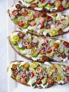 Gabrielle Hamilton's Avocado  Sandwich: French peasant bread layered with ricotta, avocado, grape tomatoes, onion, toasted sesame and poppy seeds, lemon zest and olive oil