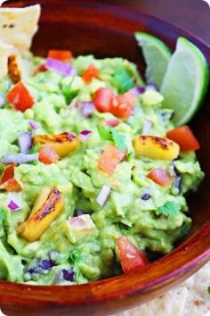Vegan/GF/Vegetarian - Grilled Pineapple Guacamole - made with smoky, sweet grilled pineapple chunks, avocados, tomatoes, red onion, jalapeno pepper, cilantro, fresh lime juice, kosher salt & pepper. Serve with a pile of tortilla chips and an ice cold #Savory| http://savoryisac.blogspot.com