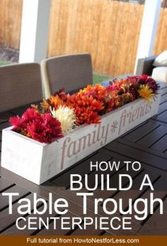 How to build a table trough centerpiece! Change out the flowers for every season, too. LOVE! Would work for a wedding table centerpiece.