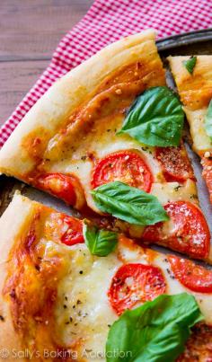 Sometimes you cant beat fresh, simple, and classic Margherita Pizza. This homemade pizza recipe hits the spot and is so easy to make!