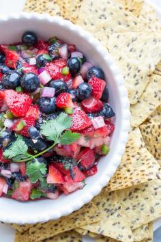 This fresh Berry Salsa, with blueberries and strawberries is the perfect combination of sweet, citrusy and spicy. Wonderful served with crisp and salty tortilla chips. | @tasteLUVnourish