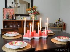 Update your dining room for summer with a few inexpensive items. My DIY centerpiece only cost $2 plus paint! Full tutorial included.
