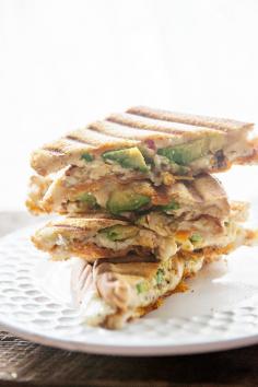 
                    
                        Avocado and Pesto Cheesy Panini Recipe ~ This food truck inspired panini grilled cheese recipe features fresh California Avocados, Sundried Tomato and Olive Pesto and Tomato Basil Cheddar Cheese. You won’t want to miss this recipe!
                    
                
