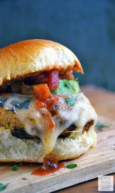 
                    
                        You've got to try these Spicy Chicken Burgers | by Life Tastes Good! They combine the familiar Tex-Mex tastes of jalapenos, pepperjack cheese, avocados, and salsa in a flavorful chicken burger. It's almost like eating a chicken taco, but in burger form, which makes it a thousand times better! Right?!
                    
                