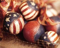 Red, White, and Blue Baseballs for 4th of July! What a great way to take old baseballs and paint them and make use them in a holiday centerpiece!