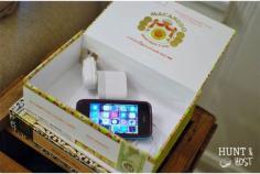 DIY Charging Station - Surprise! Hiding inside of this cool old cigar box is your top secret cell phone charging station. So easy to DIY...www.huntandhost.com