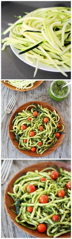 Easy Zucchini Noodles with Pesto /// I made this with 2 pounds of zucchini and about 16 oz of cherry tomatoes. I only used about 3 tablespoons of pesto, which I would increase for next time to 4 or 5. Otherwise, keep it.