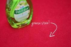 Remove grease stains from clothes with dish soap. I use Dawn...it has even gotten out stains in shirts that had been through the dryer!