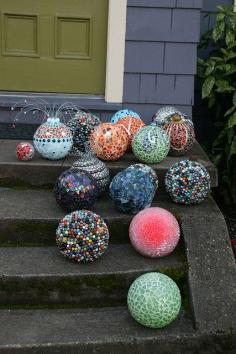Reclaimed glass and bowling ball, garden art.   Can always find old bowling balls at rummage sales!