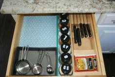 Spice Storage Update use dowel rods to keep spice jars from moving