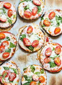 Eggplant Pizza Recipe Main Dishes with eggplant, tomato sauce, provolone cheese, cherry tomatoes, fresh spinach, Himalayan salt, pepper flakes