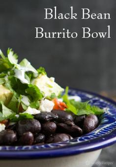 Black Bean Burrito Bowl. With black beans, rice, avocados, salsa, red cabbage, and lime | SimplyRecipes.com