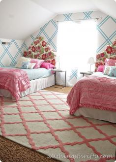 girls room with rug. Love attic bedrooms.