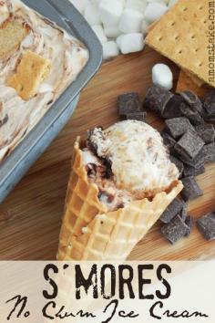 Creamy, delicious, taste of summer in a bite! Smores no churn ice cream recipe that is easy to make with marshmallows, chocolate, graham crackers and fudge!