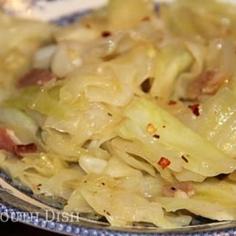 Southern Fried Cabbage Recipe with bacon, butter, chopped onion, cabbage, kosher salt, cracked black pepper, cajun seasoning, apple cider vinegar, red pepper flakes