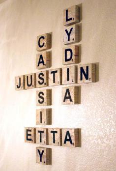 Scrabble letters Family Names art project!  Cute idea for the family room :)