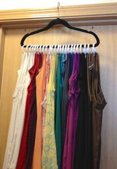 Tank Top space saver. Hanger with shower hooks. Great idea!