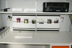 Use a curtain rod to display Instagram prints!