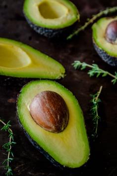 Avocado Baked Eggs w/ Creme Fraiche & Herbs