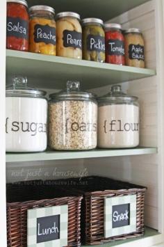 DIY: Tons of Organized Pantry Ideas! + a tutorial on how she painted the checkered chalkboard labels on the baskets.