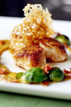 This is a rather complicated recipe, so it is only intended to those of you who already have some experience in cooking. It takes some practice in coordinating all the steps you need to do to accomplish this Seared Sea Scallops recipe. It includes a golden raisin puree and a bacon braised brussels sprouts. Let’s …