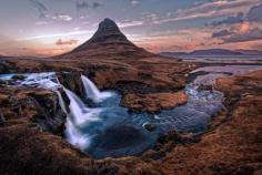 
                    
                        Majestic Kirkjufell Mountain and Kirkjufellsfoss falls in Iceland.
                    
                