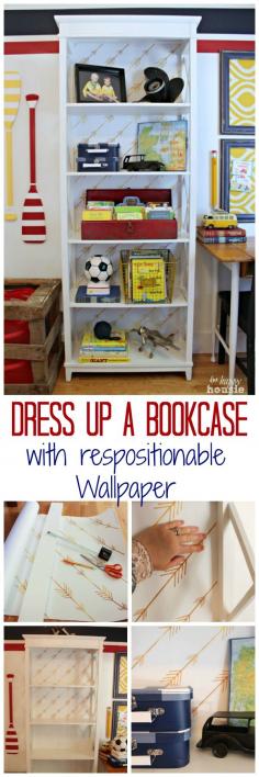 Dress up a Bookcase with Respositionable Wallpaper - how to add respositionable wallpaper to a bookcase at The Happy Housie