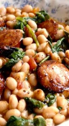 White Beans with Spinach  Sausage - sounds yummy on these cold fall days...add more broth to make it soupier.
