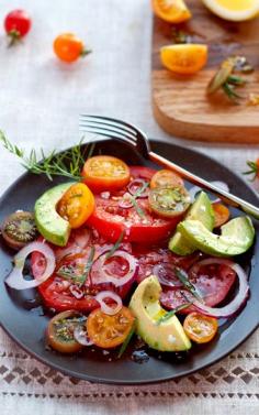 
                    
                        Fresh tomatoes and avocado with a simple vinaigrette and herby tarragon are my favorite summer salad | foodiecrush.com
                    
                