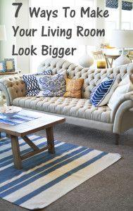 7 Ways to make your living room look bigger-- LOVE this couch!