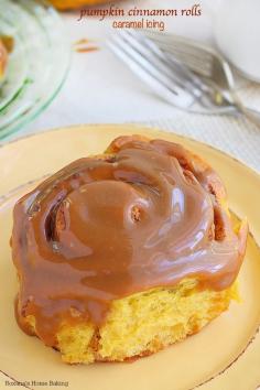 Your family will be jumping with joy after having one of these soft, fluffy and buttery pumpkin cinnamon rolls! Ribbons of cinnamon, lots of pumpkin flavor and a sticky caramel icing make these rolls totally irresistible!