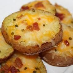 Cheese and Bacon Potato Rounds - a sensational appetizer! Superbowl finger food!


Ingredients
 4 baking potatoes, cut into 1/2 inch slices
 1/4 cup melted butter
 8 slices bacon - cooked and crumbled
 8 ounces shredded Cheddar cheese
 1/2 cup chopped green onions




 Directions
1. Preheat oven to 400 degrees F (200 degrees C). 
2. Brush both side of potato slices with butter; place them on an ungreased cookie sheet. Bake in the preheated 400 degrees F (200 degrees C) oven for 30 to 40 minutes or until lightly browned on both sides, turning once. 
3. When potatoes are ready, top with bacon, cheese, and green onion; continue baking until the cheese has melted 
